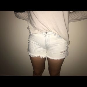White ripped shorts!